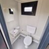 Container sanitario SCEW RAL 7016 Grigio antracite | A 2335 x L 1650 x P 1200 mm | porta a un'anta | con acqua calda Container sanitario SCEW RAL 7016 Grigio antracite | A 2335 x L 1650 x P 1200 mm | porta a un'anta | con acqua calda